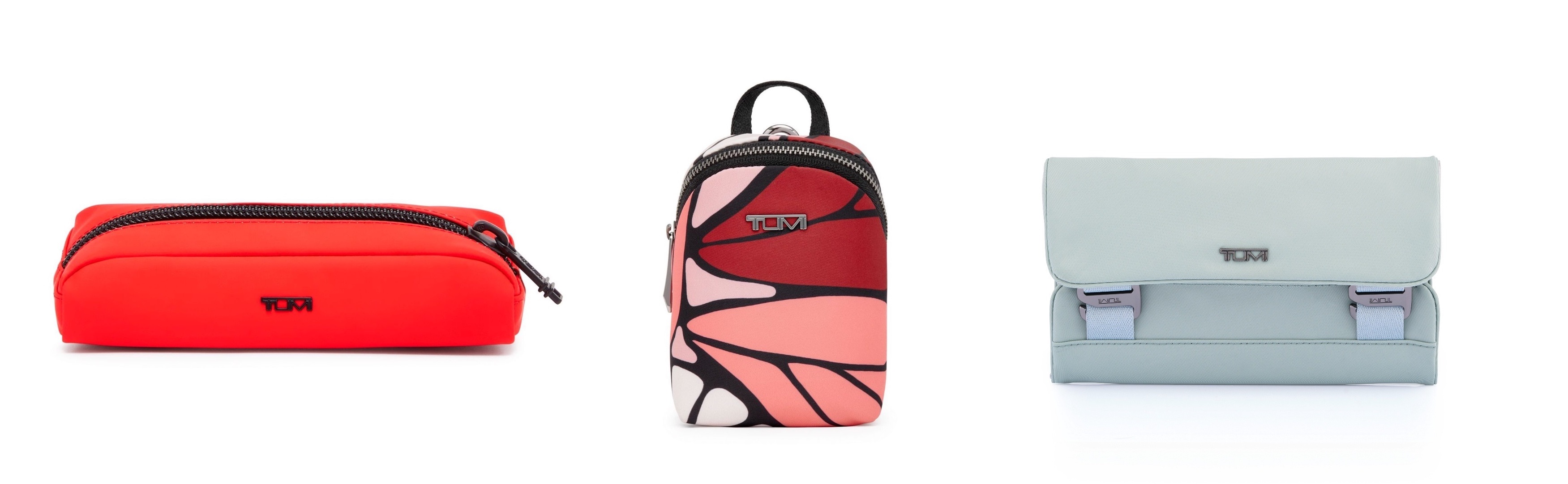 L to R: TUMI+ Small Modular Pouch in Blaze RedTUMI+ Charm Pouch in Small Swallowtail PrintTUMI+ Small Organizer in Mist