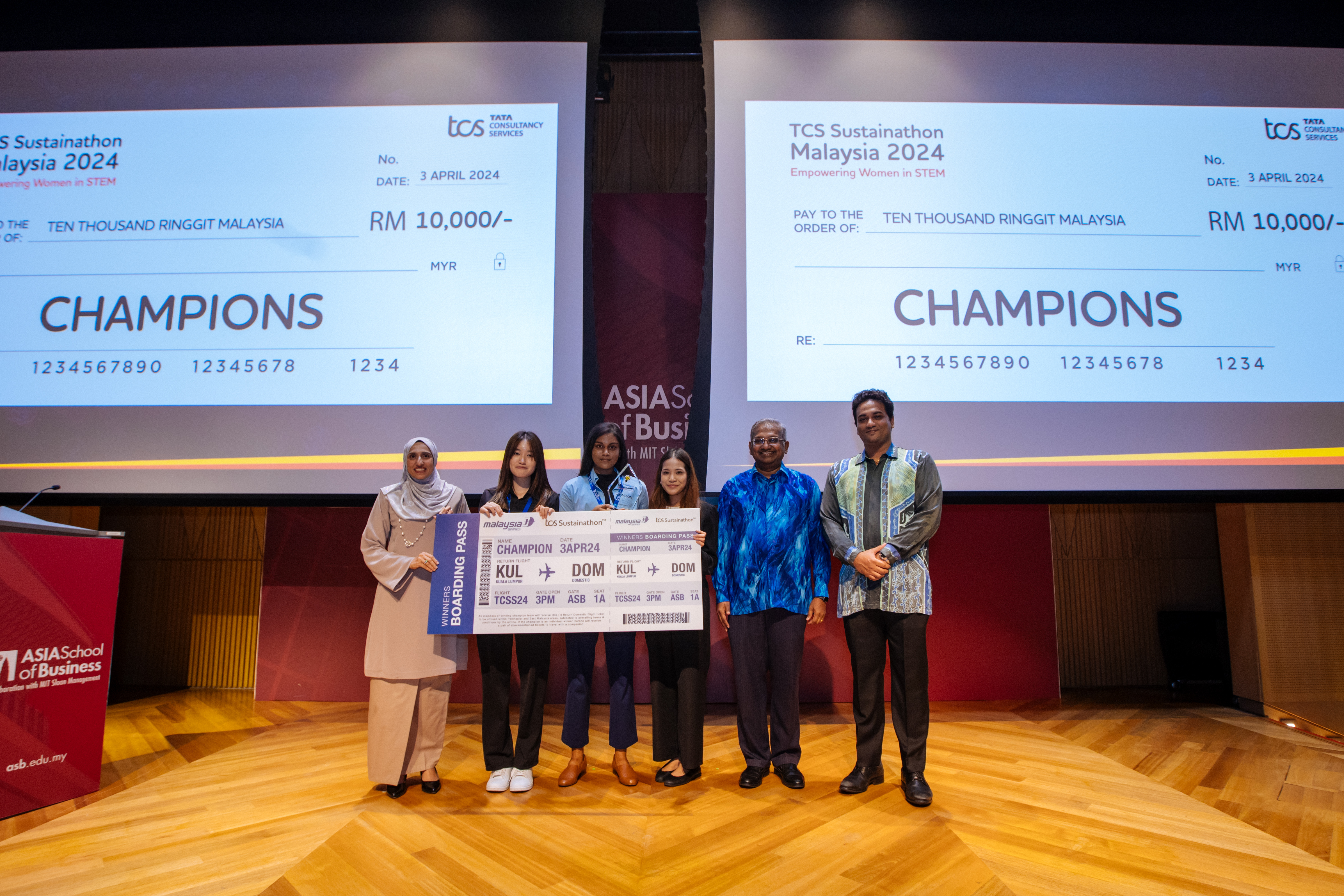 Picture 1 - Team VirtuLearn from Brickfields Asia College emerged as the overall winner for their innovative solution on e-textbooks From Left to Right: Rahimah Ali, Head of Group Sustainability of Malaysia Aviation Group; Chow Xin Ying, Claudine Ivancka Netto, Fatima Safiya Fauzy of Team VirtuLearn from Brickfields Asia College; Jeevan Rajoo, Country Head of Tata Consultancy Services (TCS Malaysia) and Dinesh Magandiran, Private Secretary to the Deputy Minister of National Unity during the closing ceremony of TCS Sustainathon Malaysia 2024 at the Asia School of Business.