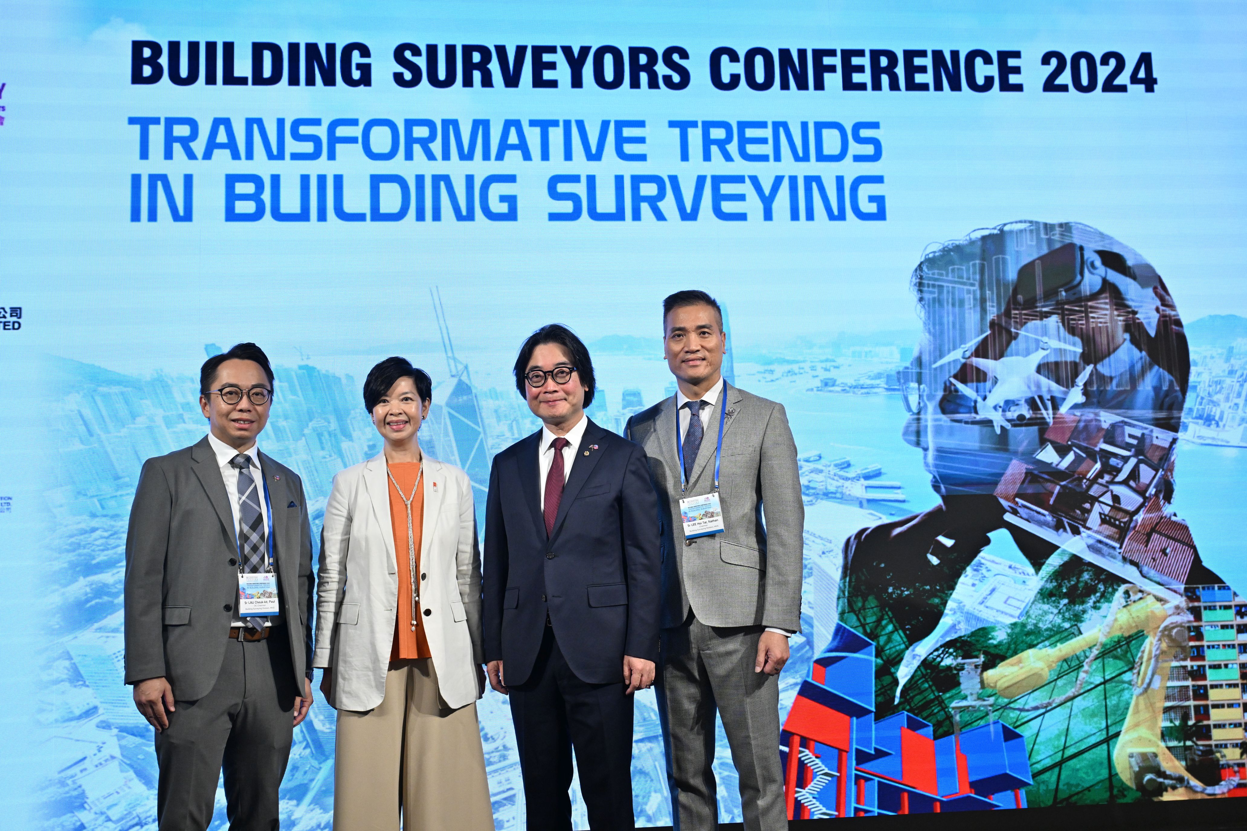 Ms HO Wing-yin, Winnie, JP, Secretary for Housing, HKSAR Government (second from left); Sr LAM Ka-fai, Francis, President of The Hong Kong Institute of Surveyors (second from right); Sr LEE Hoi-tat, Nathan, Chairman of The Hong Kong Institute of Surveyors Building Surveying Division (right); and Sr LAU Cheuk-kit, Paul, Chairman of the Organising Committee of the Building Surveyors Conference 2024(left), convenes at The Hong Kong Institute of Surveyors Building Surveyors Conference 2024, sharing valuable insights and expertise.