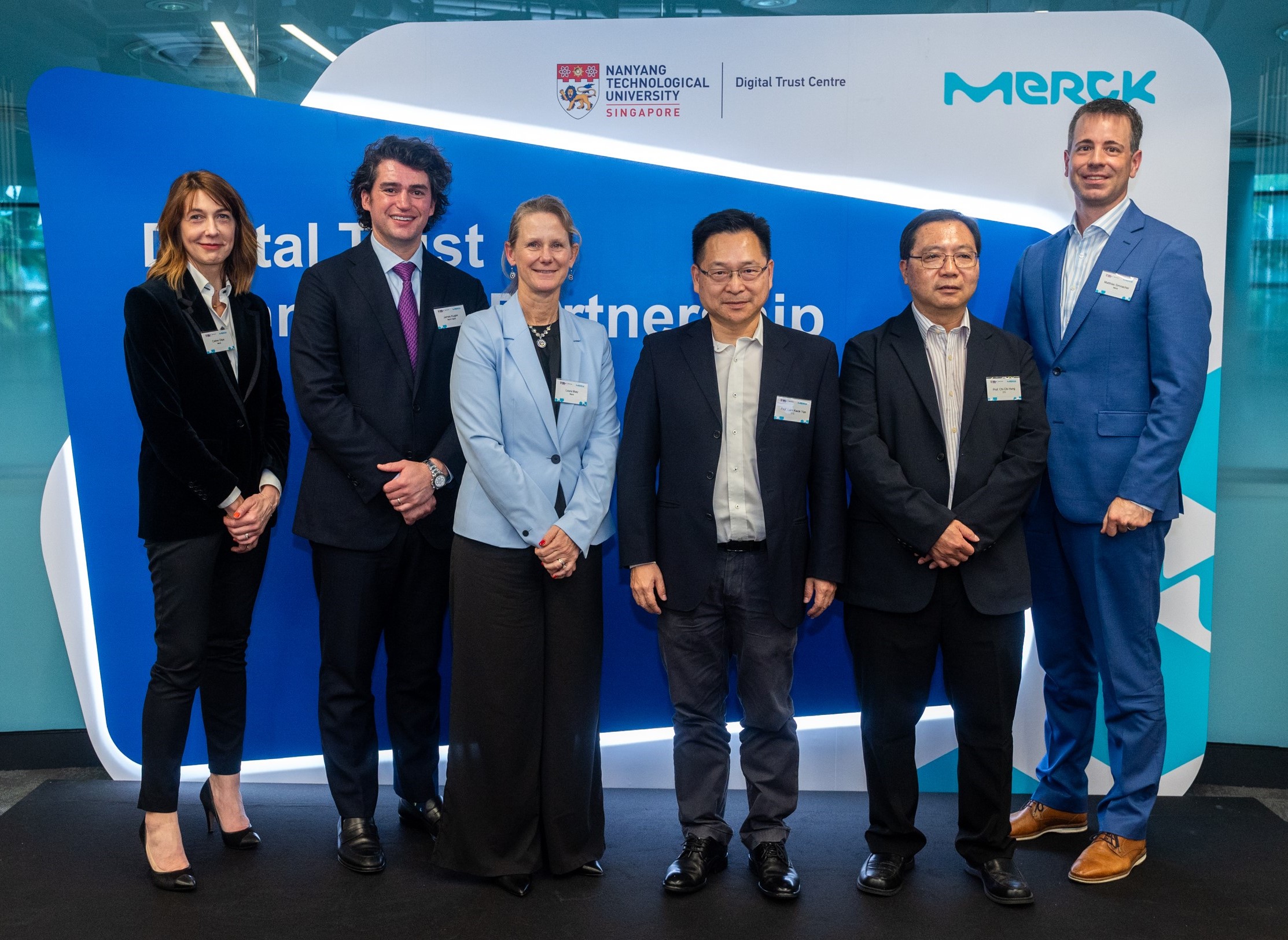 From L to R: Celine Glipa (VP, Head of Business Innovation Excellence at Merck), James Kugler (Chief Digital Officer at Merck and CEO EMD Digital), Laura Matz (Chief Science & Technology Officer of Merck and CEO of Athinia), Prof. Professor Lam Kwok Yan (Executive Director, Digital Trust Centre), Dr. Chi Chi Hung (Senior Principal Research Scientist, Digital Trust Centre), Matthias Simnacher (Market Development Director at Merck).