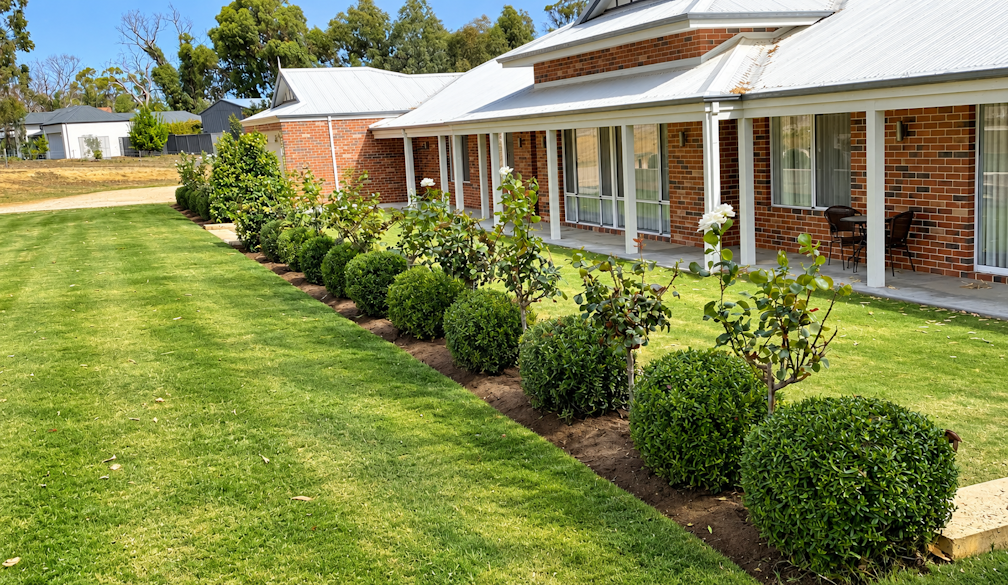 Sunny Brick Home with Formal Garden