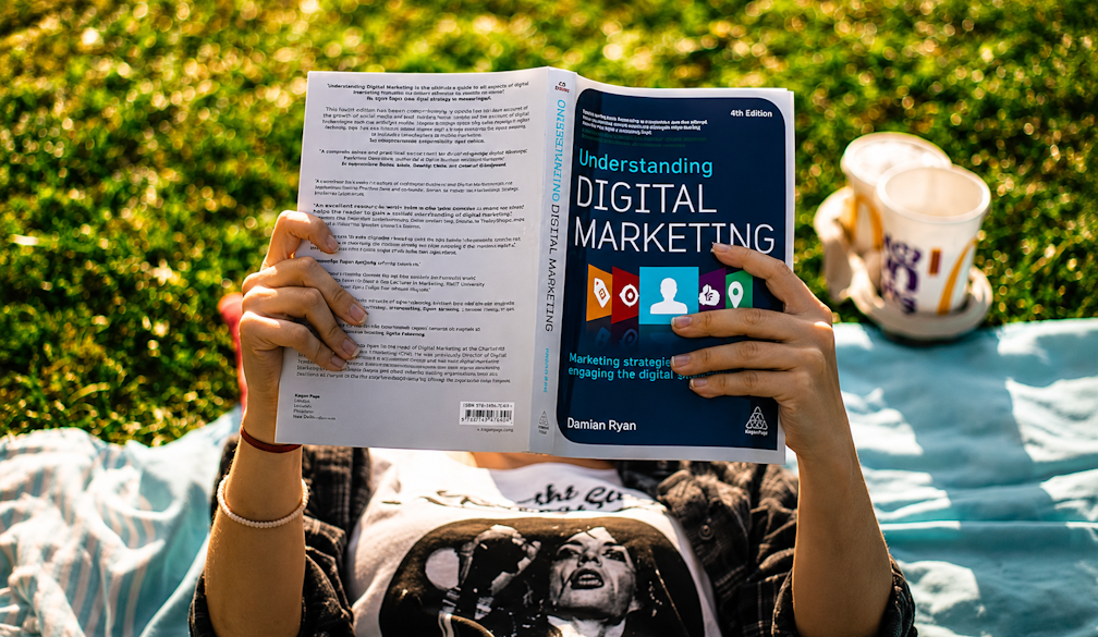 Outdoor Reading with Digital Marketing Book